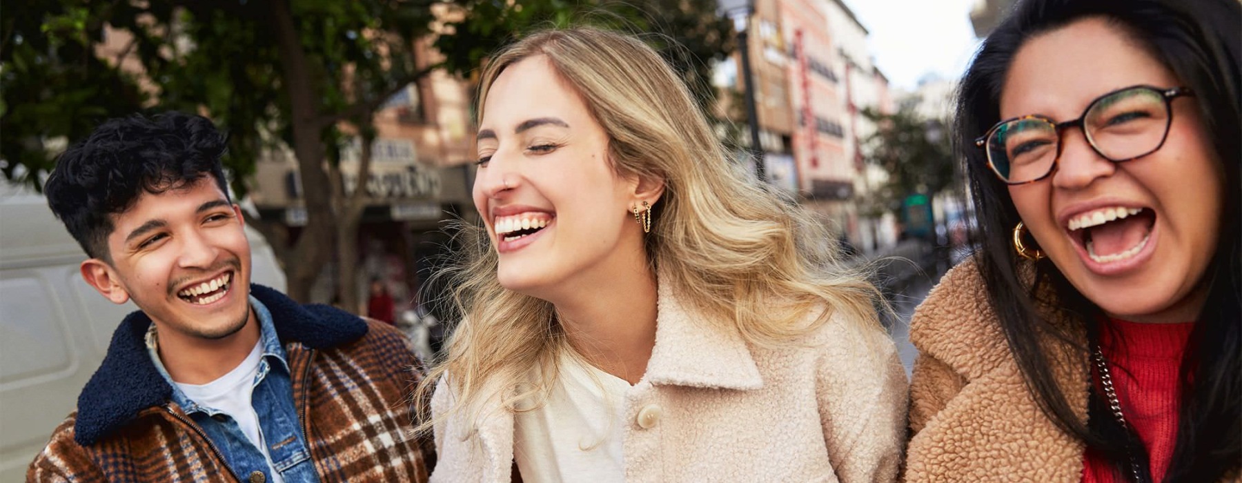 three people laughing