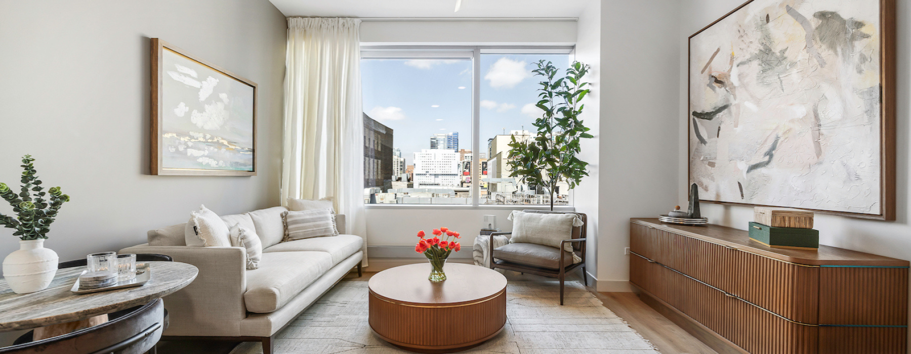 Bright studio living with soaring 10' ceilings