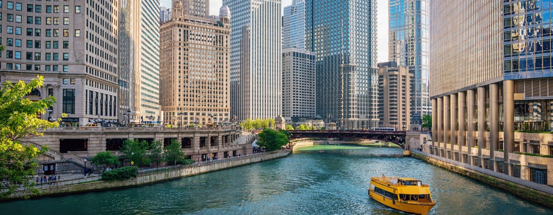a boat on a river in a city